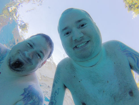 Shawn and Sean in the pool face down underwater shot